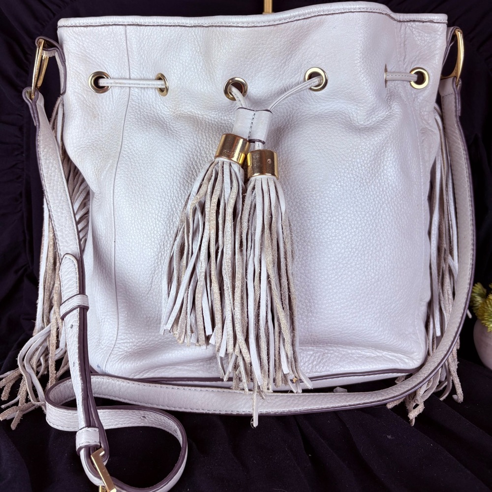 G.I.L.I. Got It. Love It. White Pebbled Leather Drawstring Hobo Tassel
